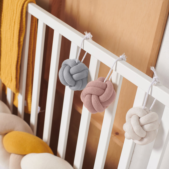 Set de 3 jouets d'éveil bébé noeuds rose