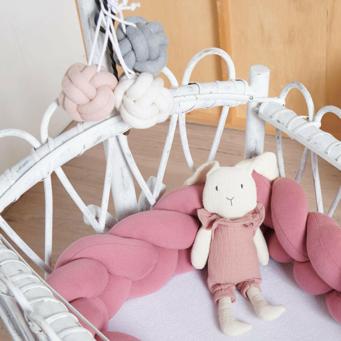 Set de 3 jouets d'éveil bébé noeuds rose